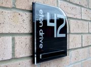 Cayman double acrylic house number sign with the iconic contrasting fixing plate by Plastic Republic. Size 200 x 200mm £41.99