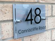 Classic Marletti shape T1 double acrylic house number sign with chrome stand off fixings by Plastic Republic. Size 210 x 148mm Price £24.98