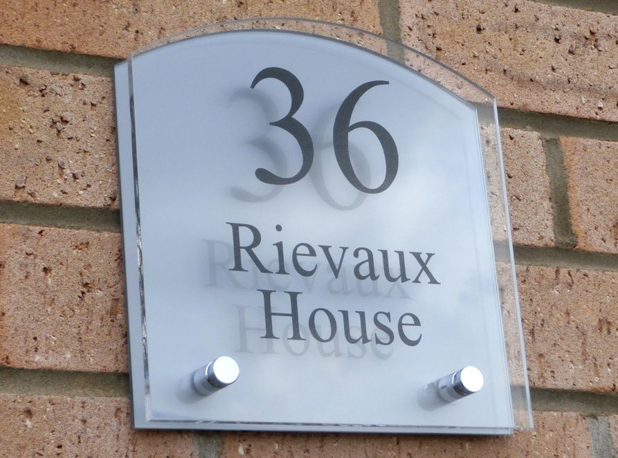 Sienna House number sign by Plastic Republic. More space for you to design a unique house plaque for your home. This T3 shape has a gently rounded top and incorporates two acrylic plates and chrome stand off fixings. Size 200 x 200mm. Price £39.98