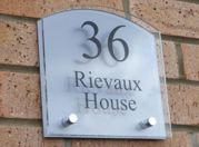 Sienna House number sign by Plastic Republic. More space for you to design a unique house plaque for your home. This T3 shape has a gently rounded top and incorporates two acrylic plates and chrome stand off fixings. Size 200 x 200mm. Price £39.98