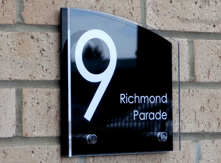 Sienna House number sign by Plastic Republic. More space for you to design a unique house plaque for your home. This T6 shape is very contemporary house number sign and incorporates two acrylic plates and chrome stand off fixings. Size 200 x 200mm. Price £39.98