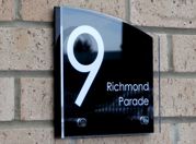 Sienna House number sign by Plastic Republic. More space for you to design a unique house plaque for your home. This T6 shape is very contemporary house number sign and incorporates two acrylic plates and chrome stand off fixings. Size 200 x 200mm. Price £39.98